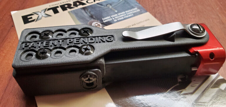 The Armory Life - DO YOU EXTRACARRY? Universal 9mm ExtraCarry Mag Pouch Review