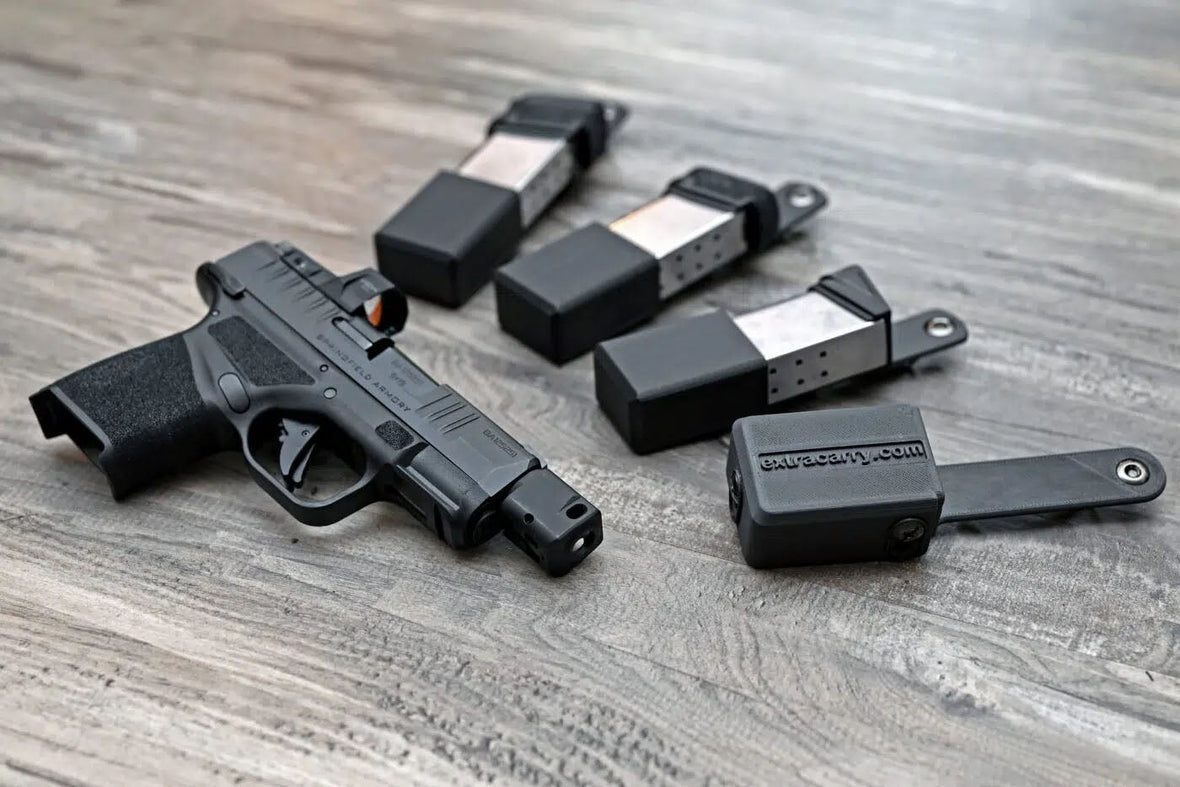 Andy Grossman pocket carrys his spare mag using an ExtraCarry mag pouch